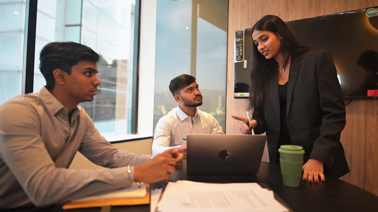 Indian business team collaborating in a modern office
